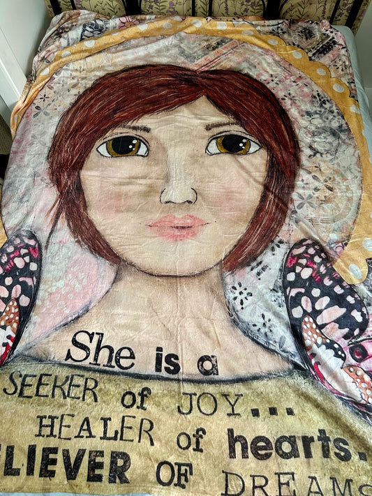 She is a Seeker of Joy. Healer of Hearts. Believer of Dreams.